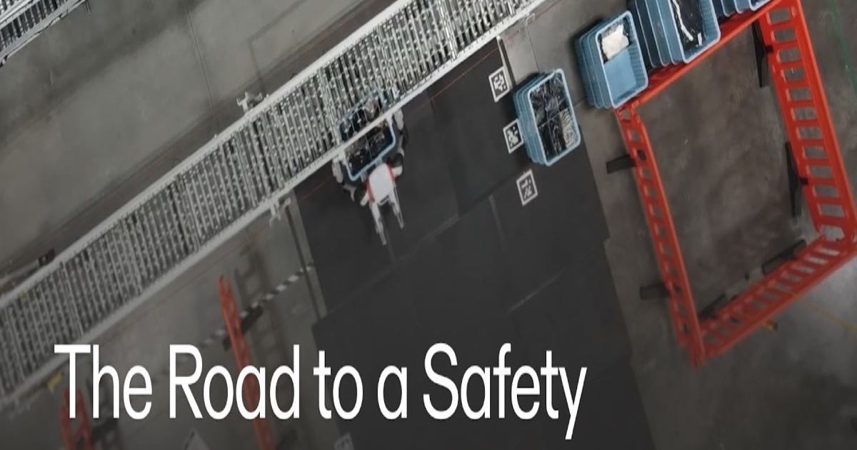 Agility Robotics Digit V5 humanoid robot working in a warehouse without safety barriers