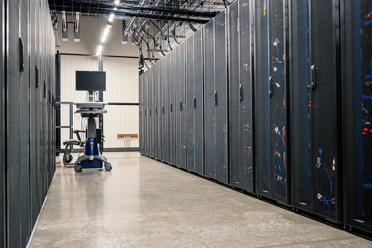 Server racks in a data center representing the backend infrastructure behind Anthropic's silent cache TTL change