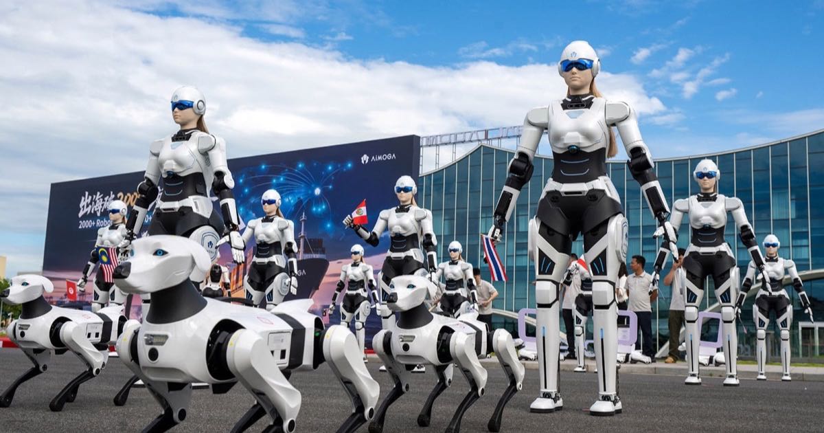 AiMOGA humanoid robots and quadruped robot dogs on display at a delivery ceremony at Chery International Industrial Park in Wuhu, China.