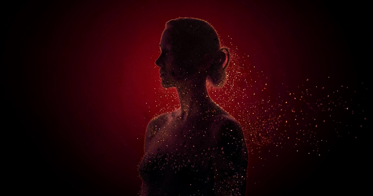 Abstract dark composition with a fading silhouette dissolving into particle light against a deep red gradient, no text, no logos