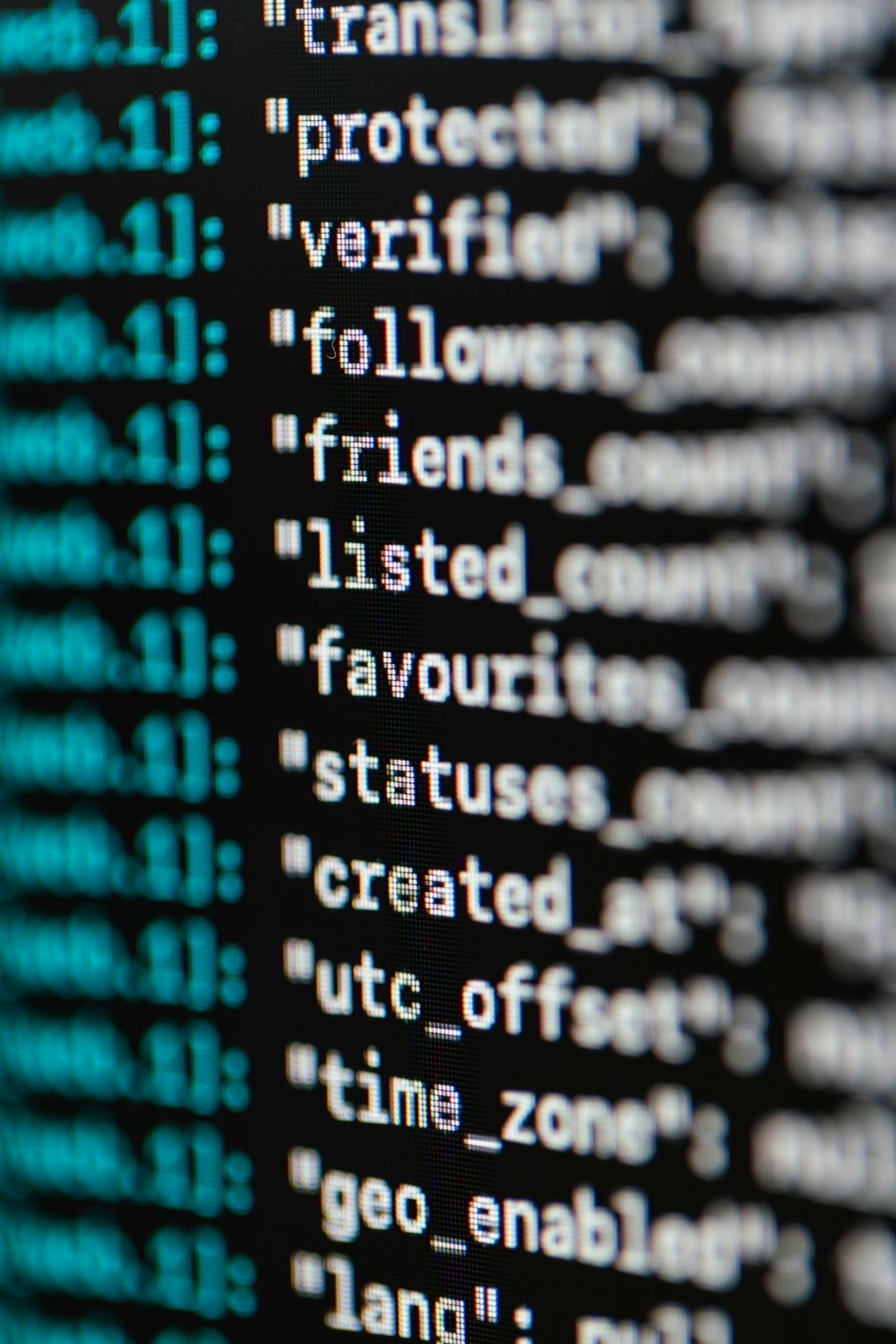 Software engineer working at laptop representing Meta's AI coding mandates