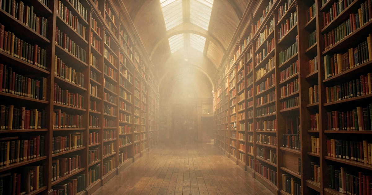 A vast library interior with towering bookshelves fading into atmospheric haze, symbolising enormous context capacity.