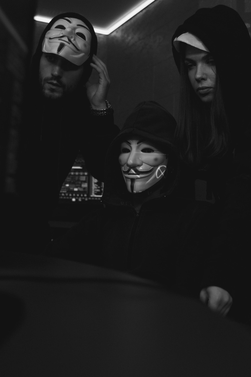 A neural network visualization with a compressed core glowing red surrounded by blue safety layers, dark background, cinematic lighting