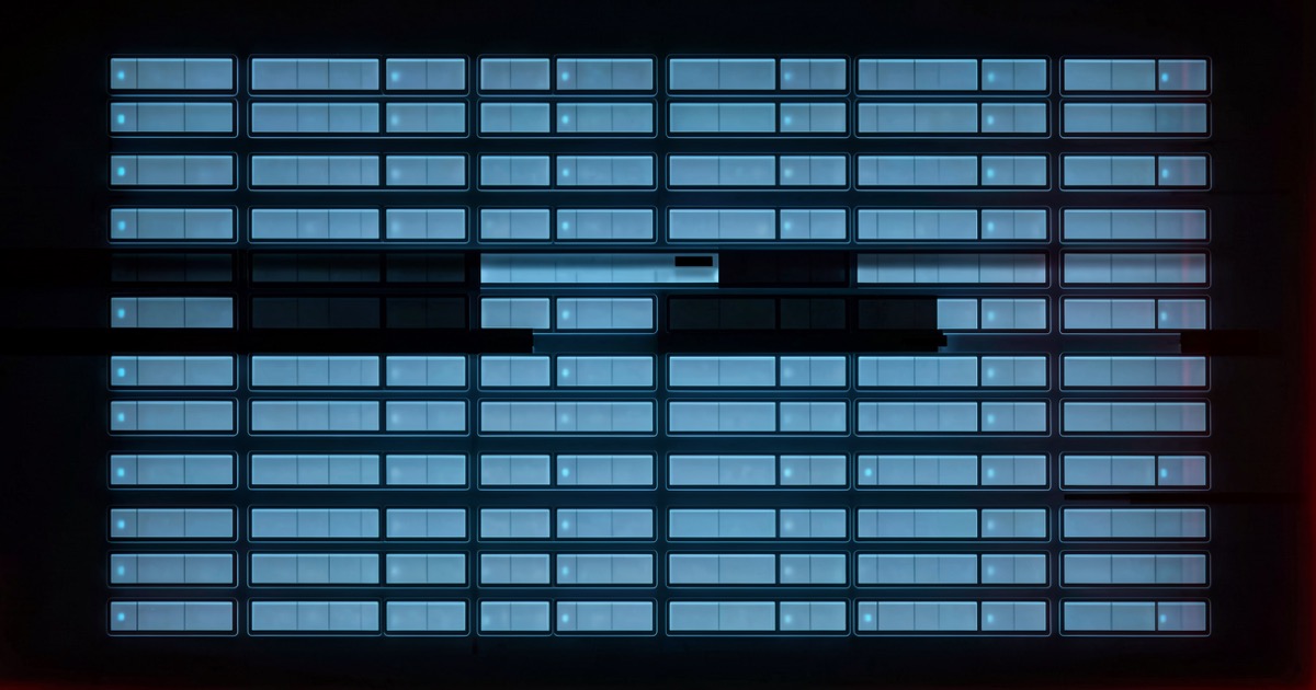 Abstract composition of a cold corporate data grid with one row darkened and disconnected, clinical blue and grey tones with a subtle red warning glow