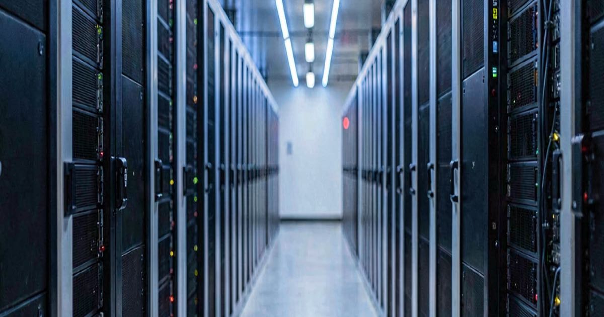 A modern data centre aisle with rows of GPU servers, cool blue lighting, editorial photography style