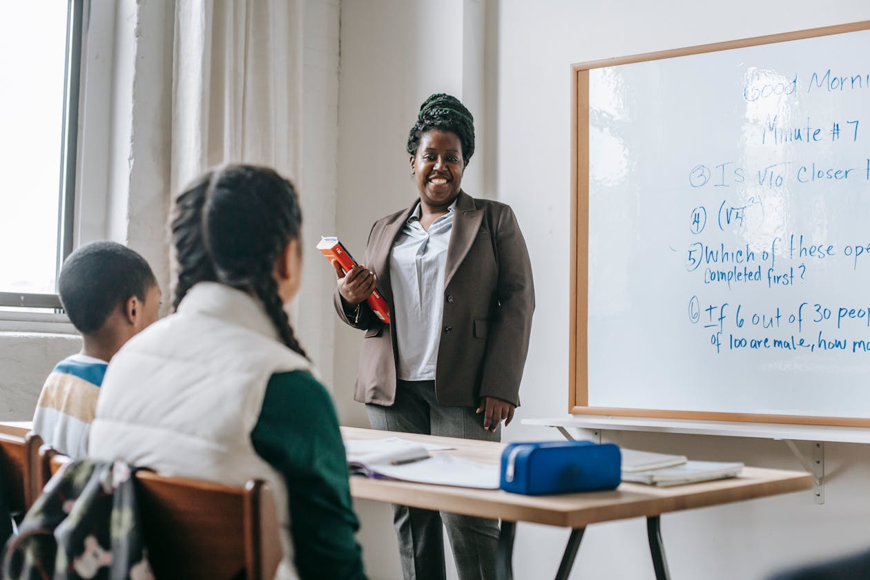Teacher in classroom with AI technology, highlighting the training gap