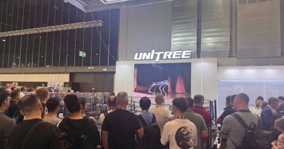 Unitree robots displayed on a large video screen at IFA 2026 in Berlin